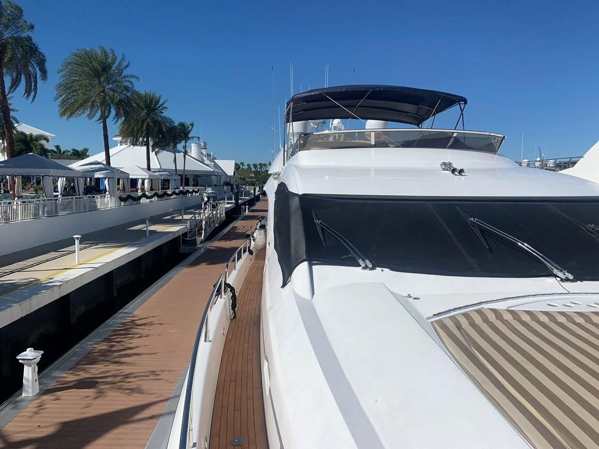 a boat docked at a pier aboard MY MEDICINE Yacht for Sale