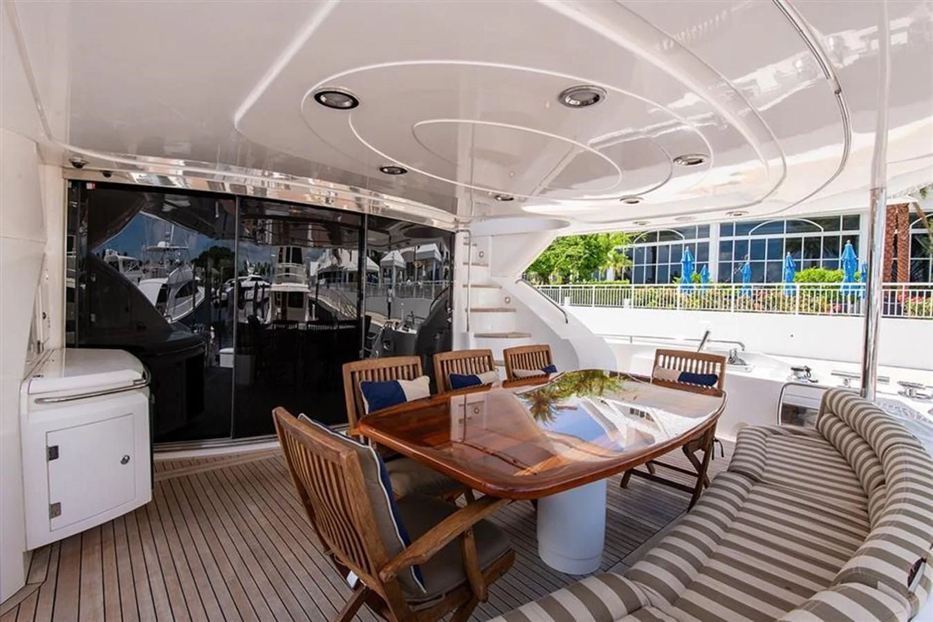 a room with a table and chairs aboard MY MEDICINE Yacht for Sale