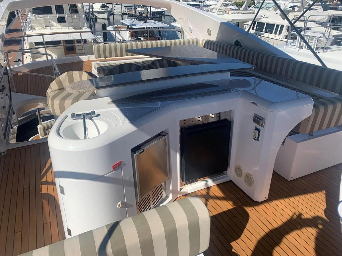 a boat with a deck aboard MY MEDICINE Yacht for Sale