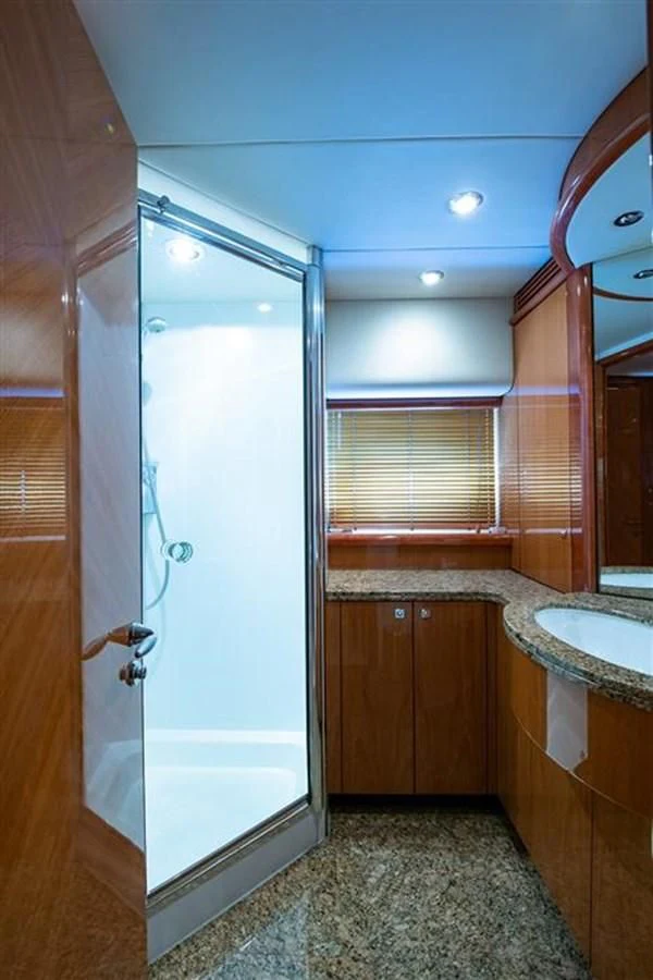 a bathroom with a shower and sink aboard MY MEDICINE Yacht for Sale