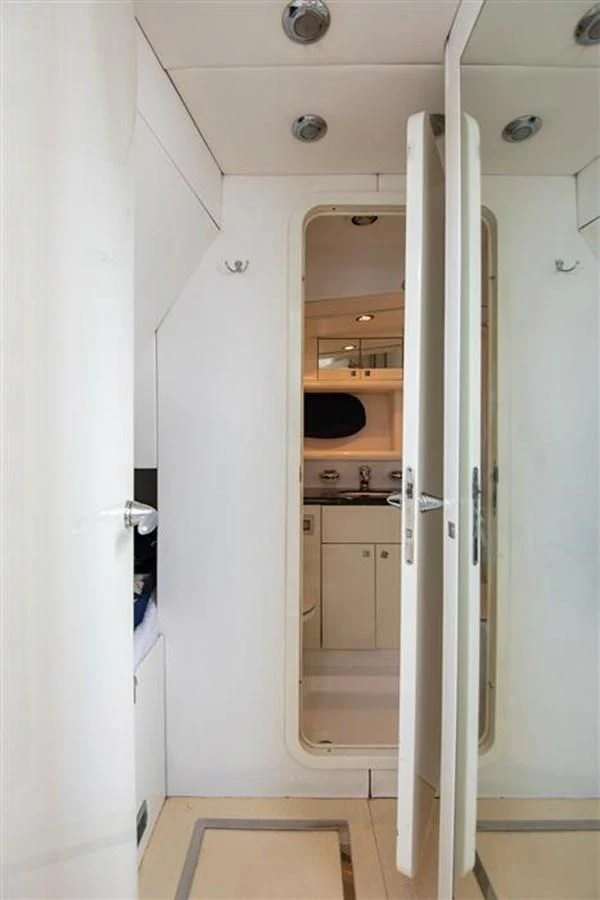 a hallway with a door and a sink aboard MY MEDICINE Yacht for Sale