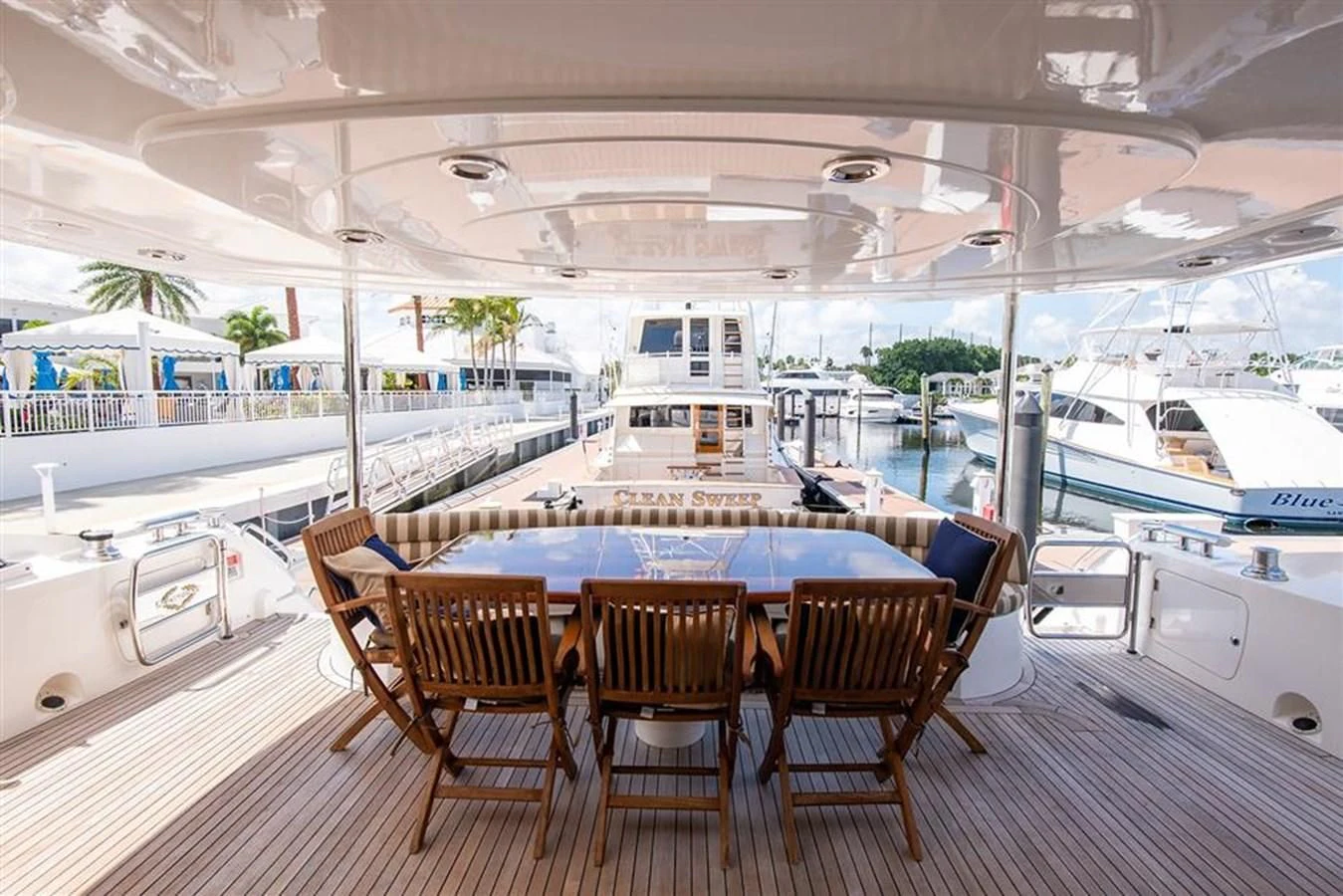 a table and chairs on a boat aboard MY MEDICINE Yacht for Sale