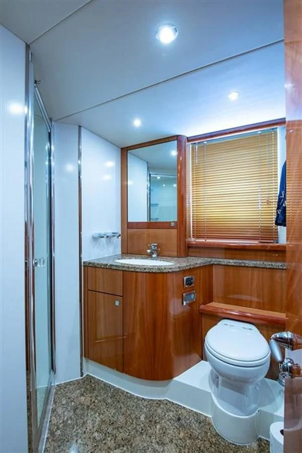 a bathroom with a toilet and a sink aboard MY MEDICINE Yacht for Sale