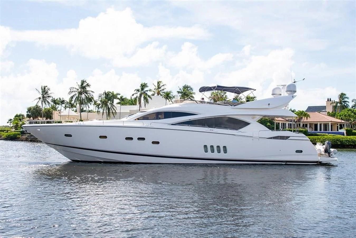 a white yacht on the water aboard MY MEDICINE Yacht for Sale