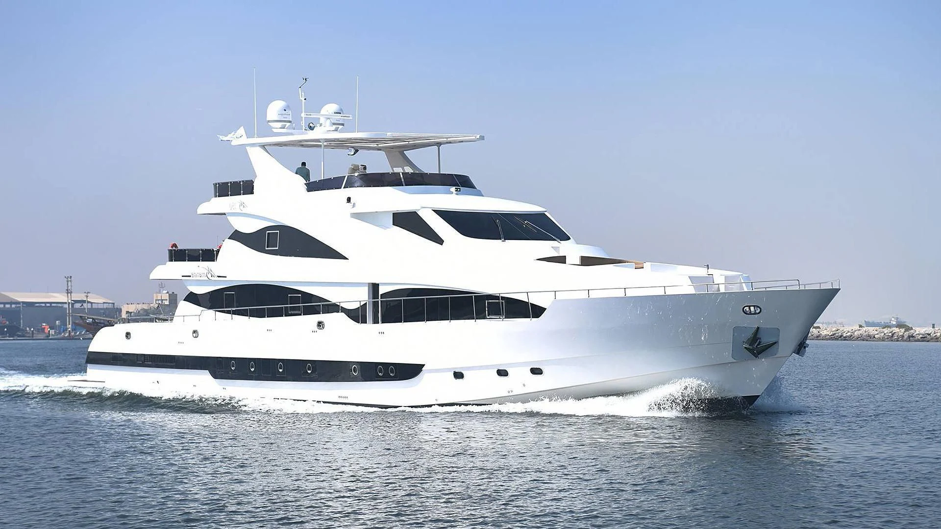 a white yacht on the water aboard STARDOM Yacht for Sale