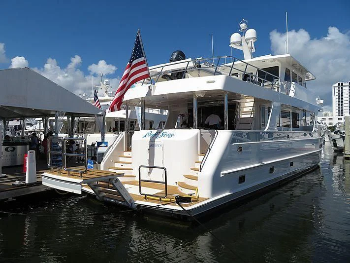 a boat docked at a pier aboard BLUE CHIP Yacht for Sale