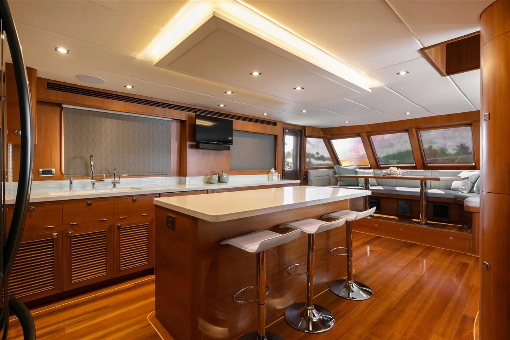 a kitchen with a bar and a bar aboard BLUE CHIP Yacht for Sale
