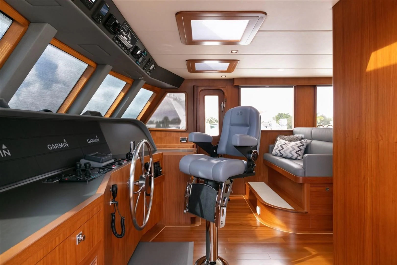 a room with a couch and a chair and a desk aboard BLUE CHIP Yacht for Sale