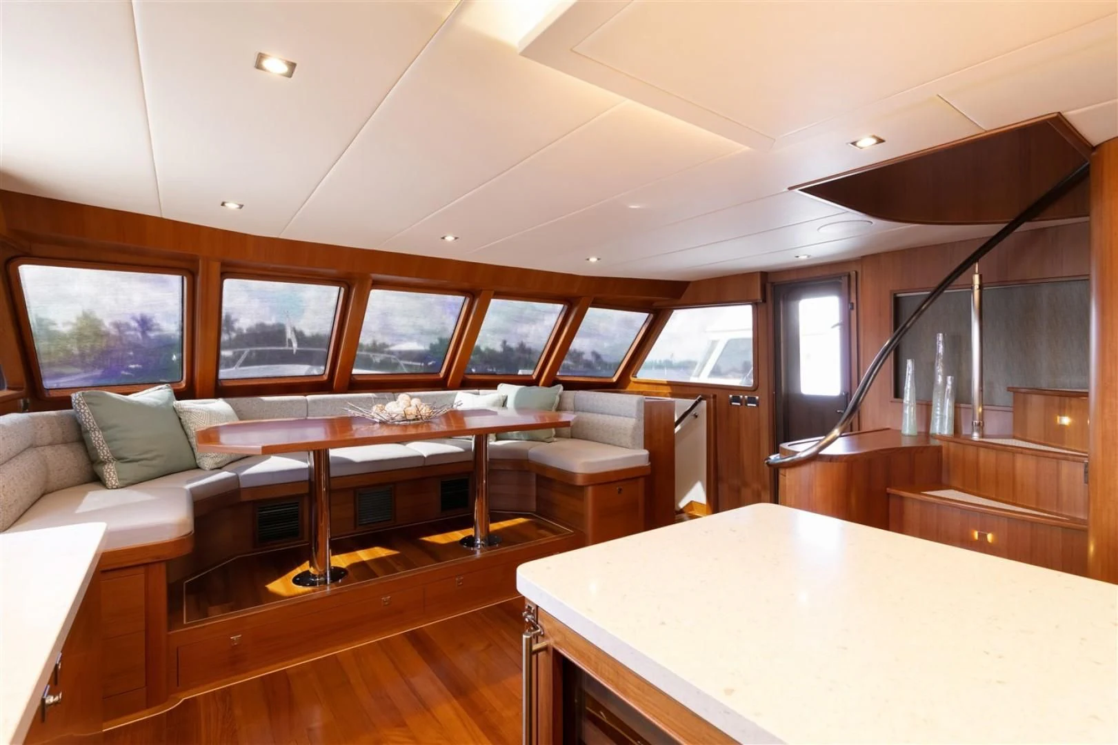 a room with a table and chairs aboard BLUE CHIP Yacht for Sale