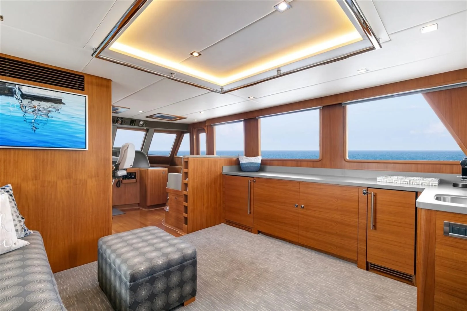 a room with a couch and a tv aboard BLUE CHIP Yacht for Sale