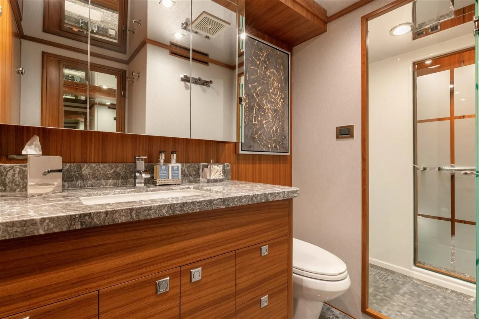 a bathroom with a marble counter top aboard BLUE CHIP Yacht for Sale