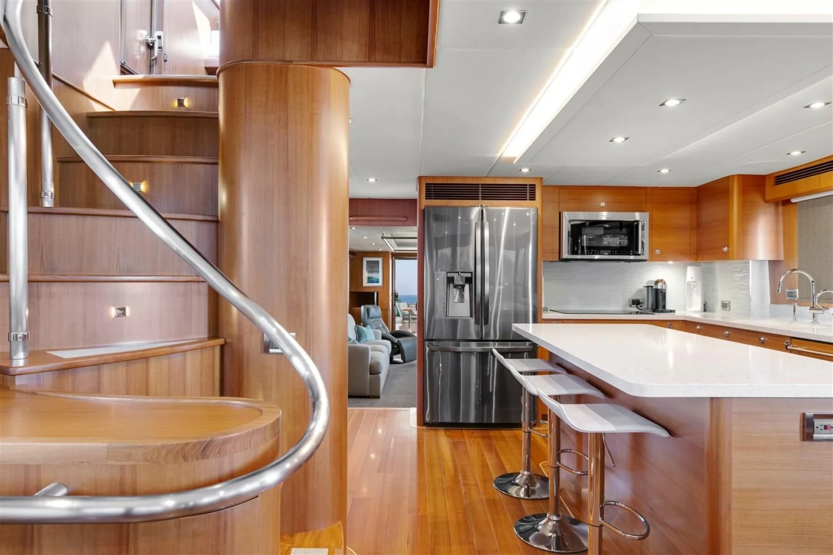 a kitchen with a stainless steel refrigerator aboard BLUE CHIP Yacht for Sale