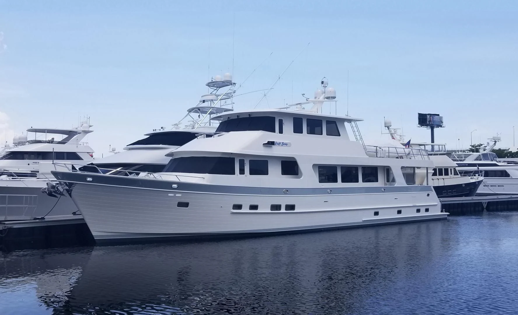 a large white yacht aboard BLUE CHIP Yacht for Sale