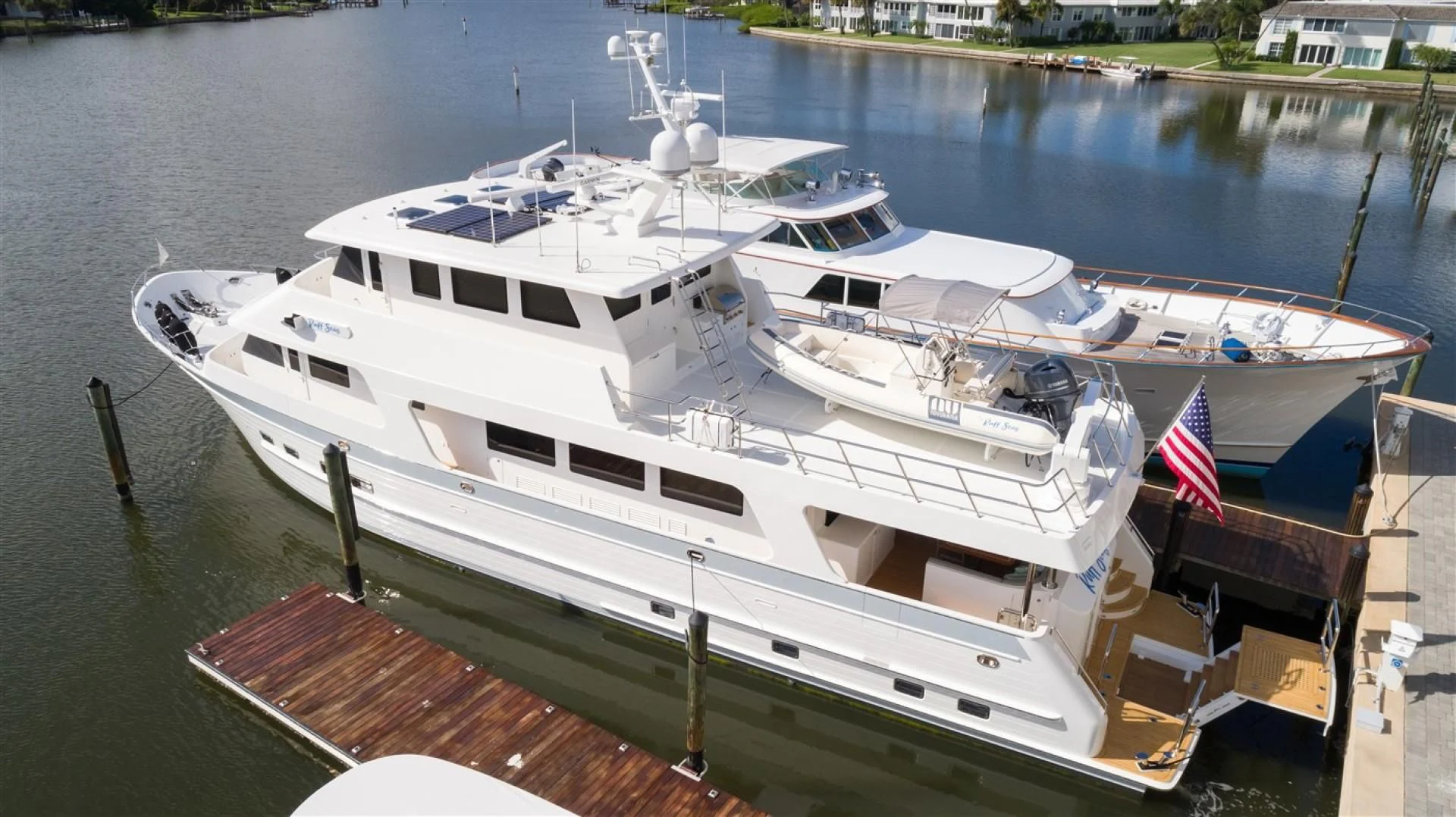 a boat docked at a pier aboard BLUE CHIP Yacht for Sale