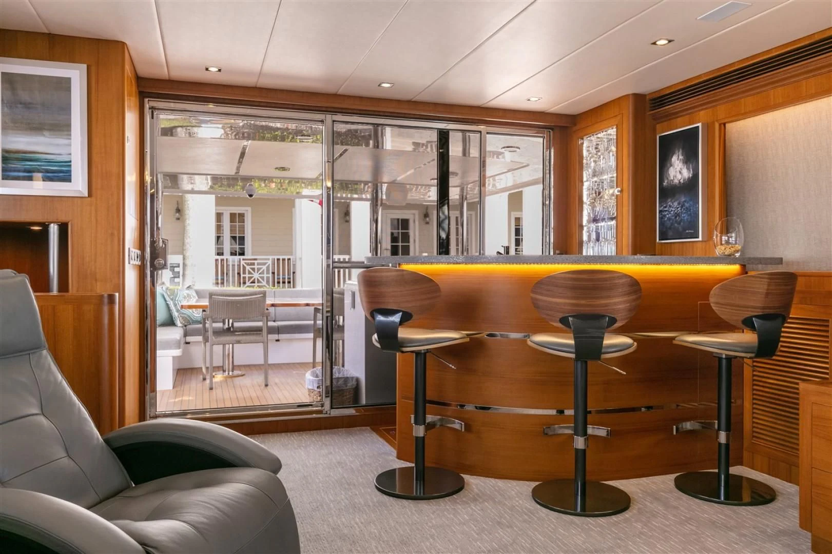 a room with a table and chairs aboard BLUE CHIP Yacht for Sale