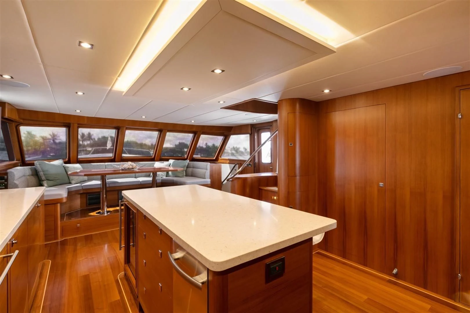 a large kitchen with a bar and bar aboard BLUE CHIP Yacht for Sale