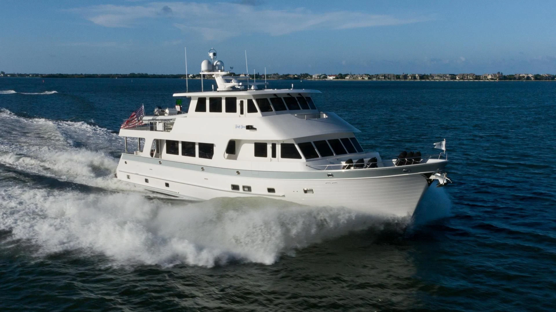 a boat on the water aboard BLUE CHIP Yacht for Sale