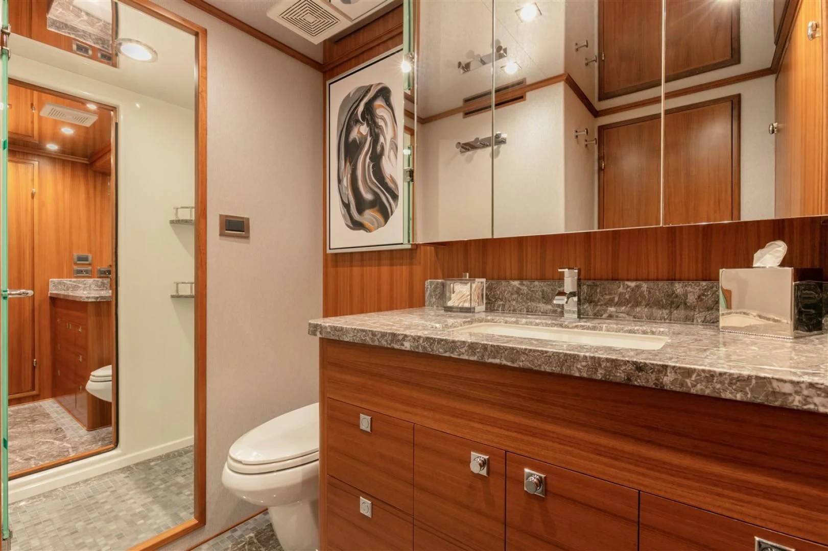 a bathroom with a sink and a toilet aboard BLUE CHIP Yacht for Sale