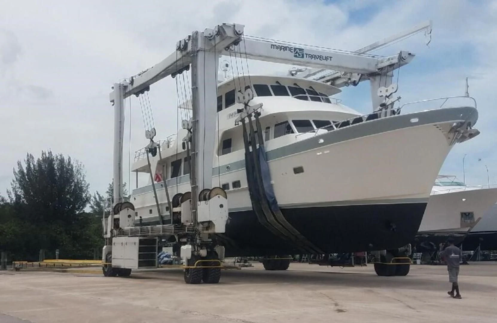 a large white boat aboard BLUE CHIP Yacht for Sale
