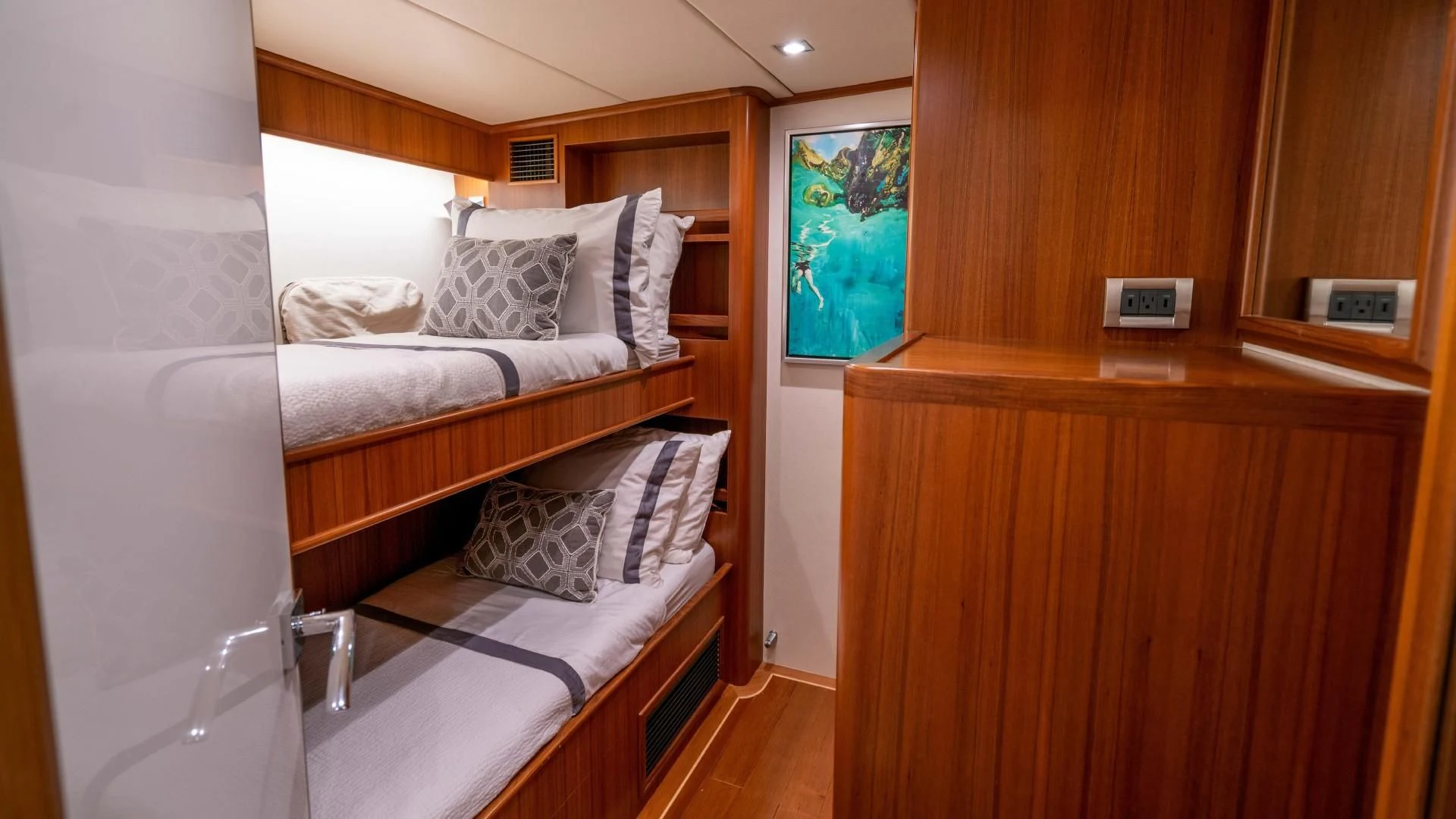 a room with a bed and a desk aboard BLUE CHIP Yacht for Sale