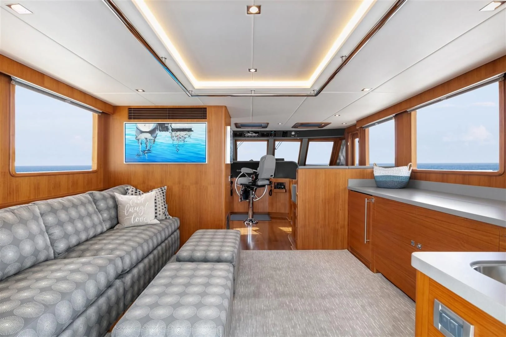 a room with a couch and a chair aboard BLUE CHIP Yacht for Sale