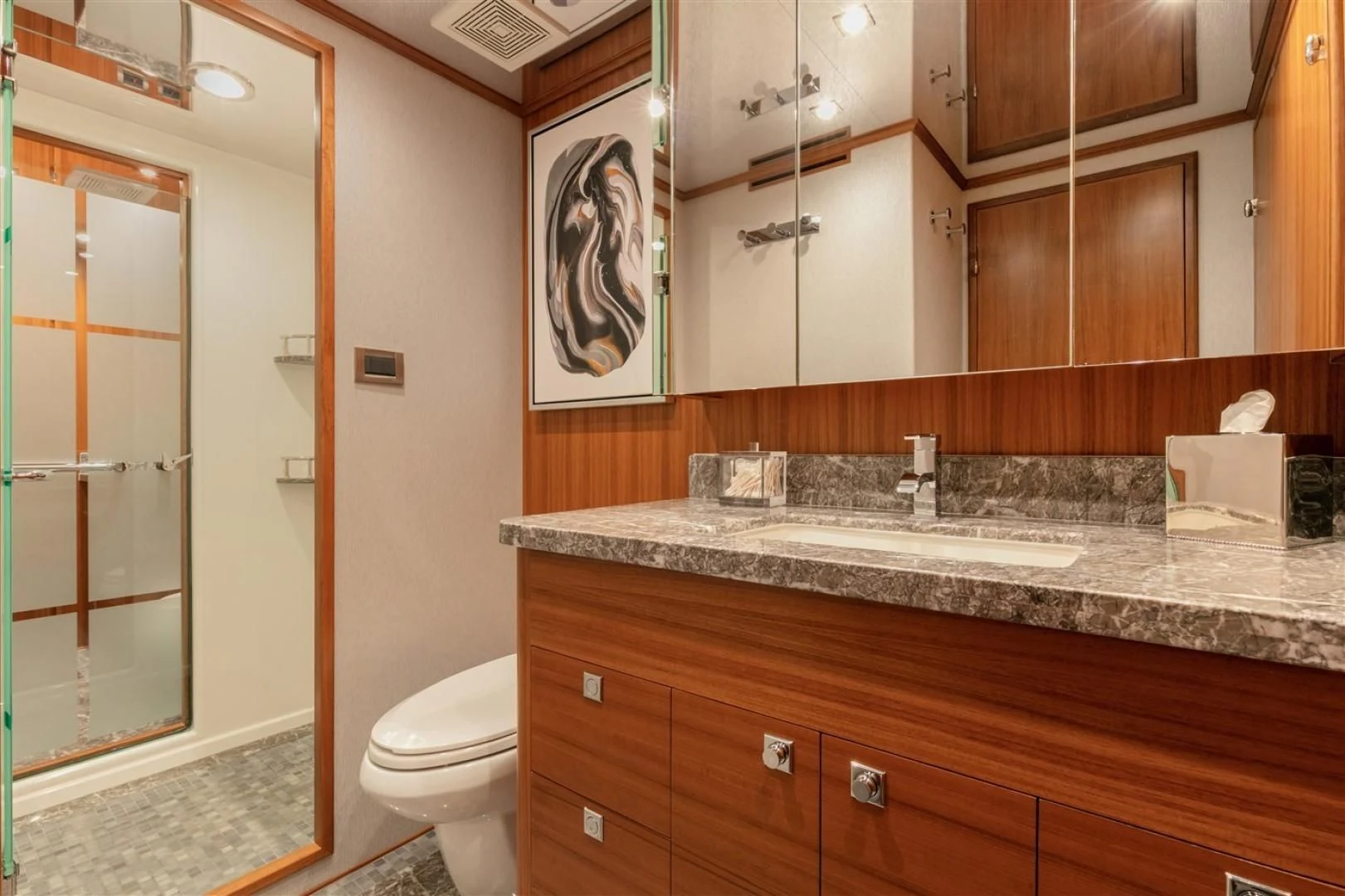a bathroom with a sink and a toilet aboard BLUE CHIP Yacht for Sale