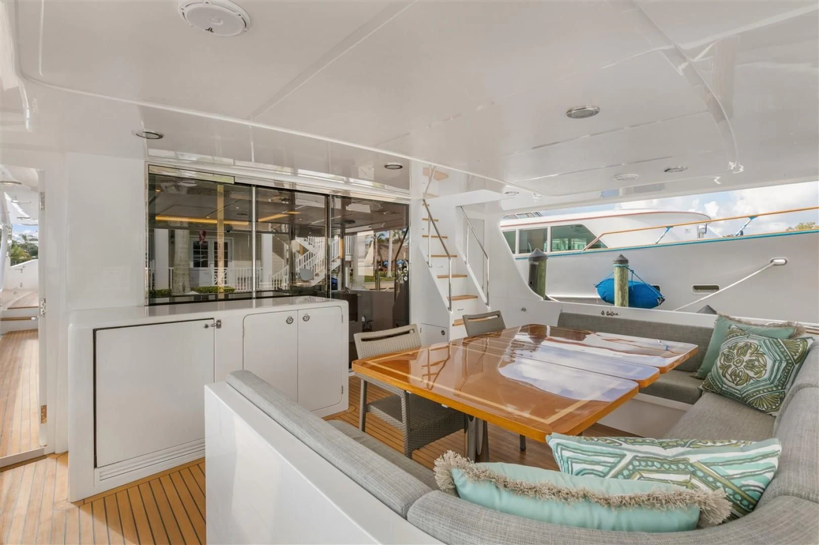 a room with a couch and a table aboard BLUE CHIP Yacht for Sale
