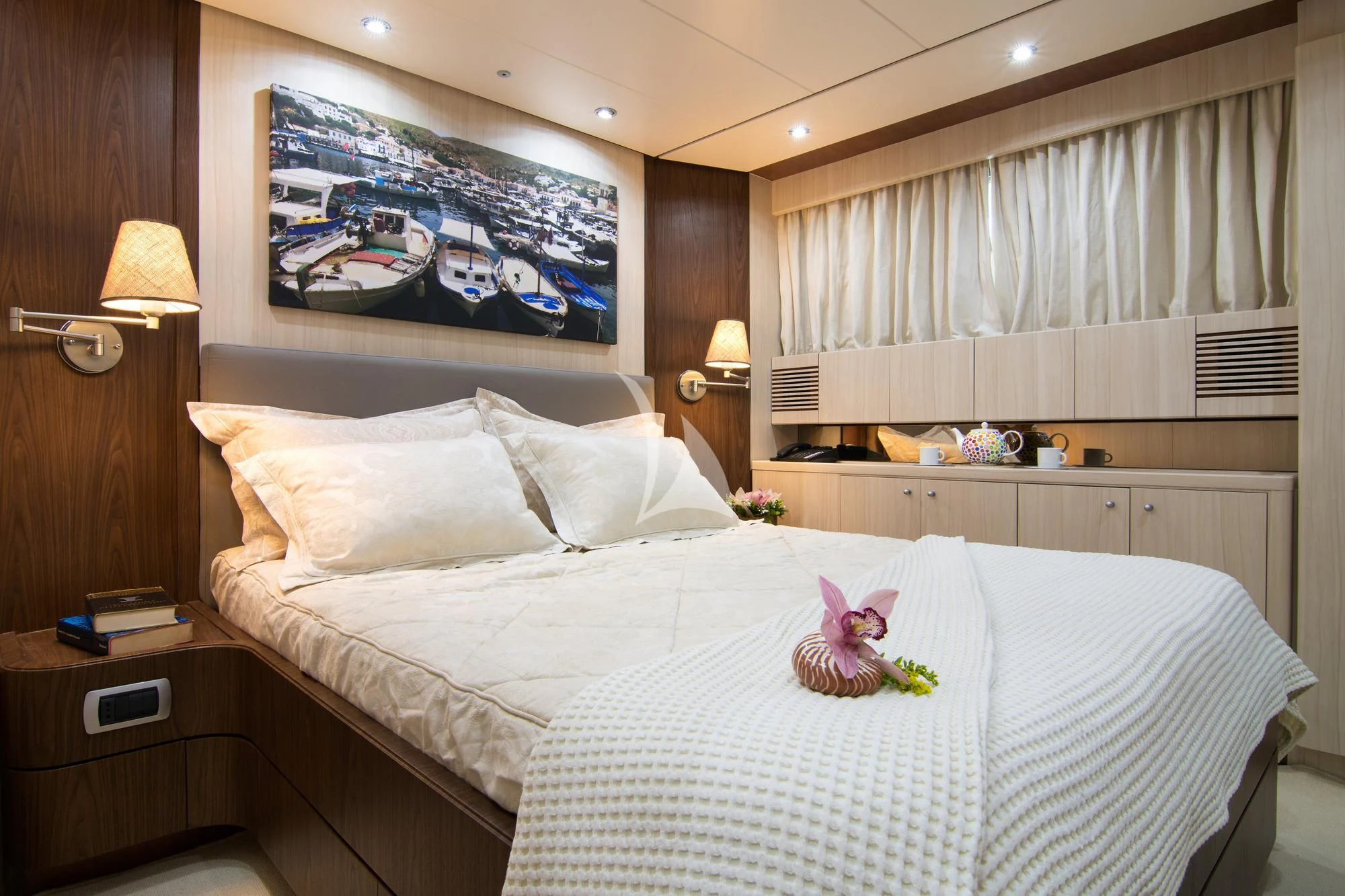 a hotel room with a bed and a desk aboard ACIONNA Yacht for Sale