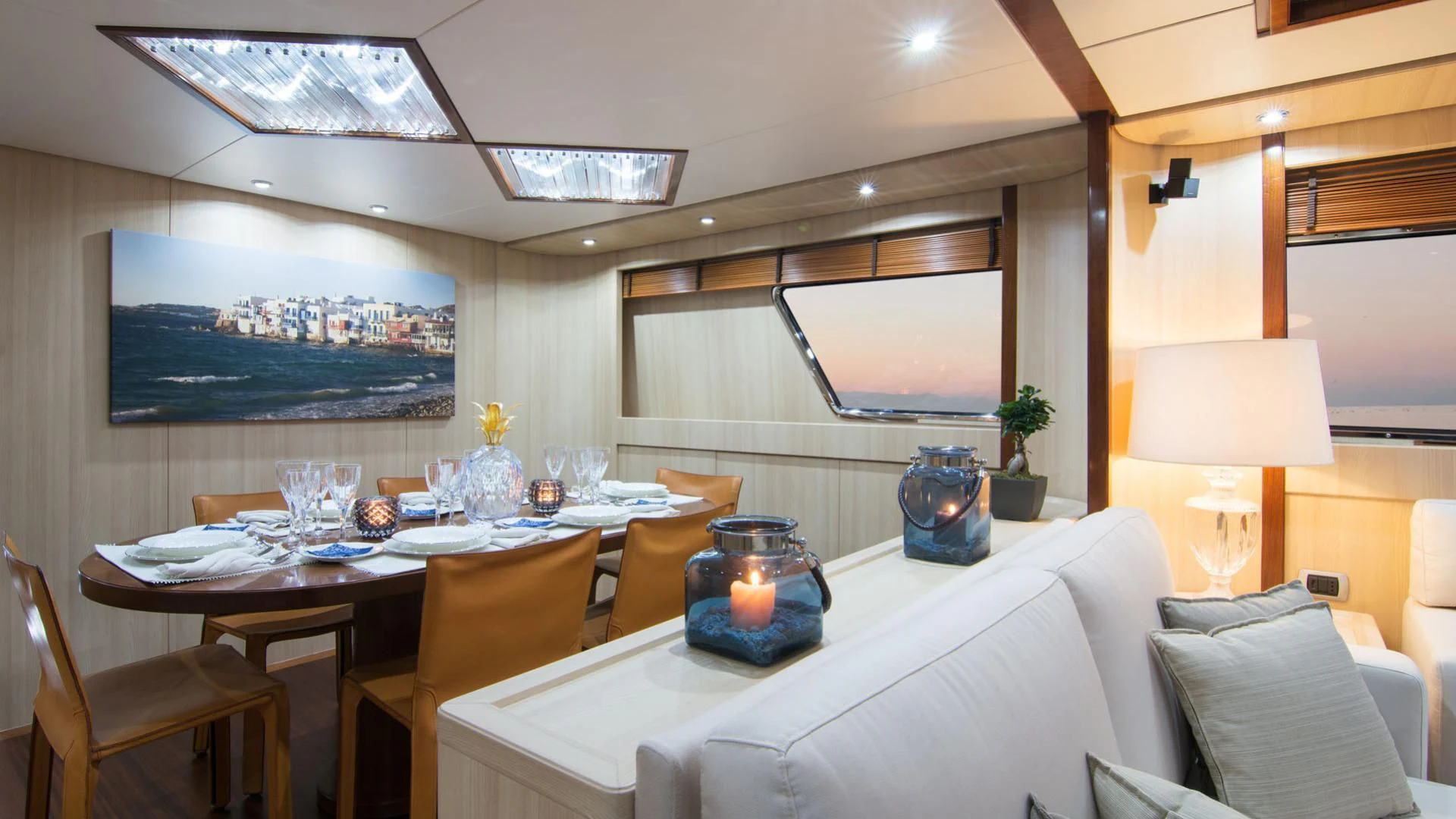 a room with a table and chairs aboard ACIONNA Yacht for Sale