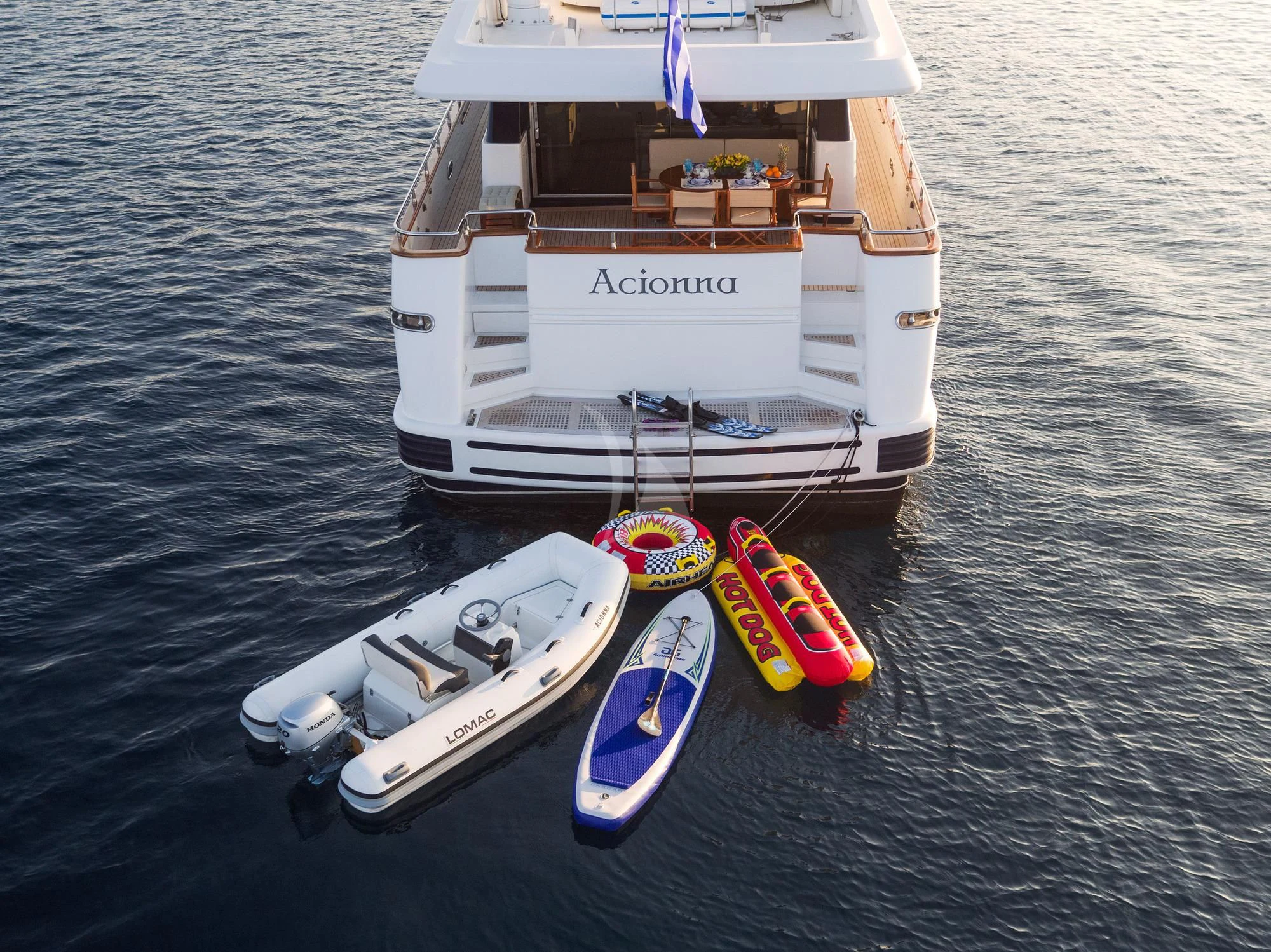 a boat with a motor attached to it aboard ACIONNA Yacht for Sale
