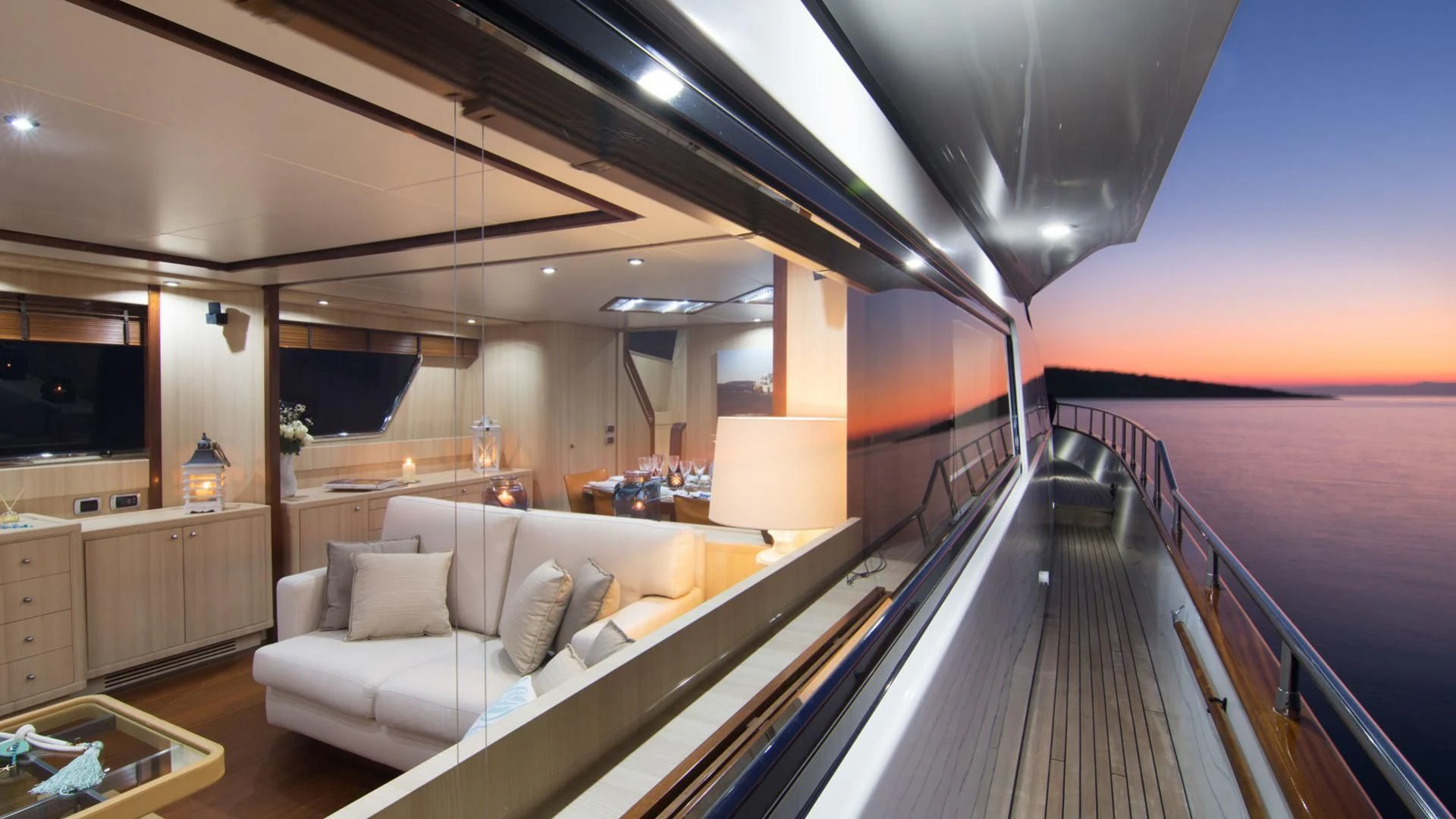 a large living room with a large balcony aboard ACIONNA Yacht for Sale