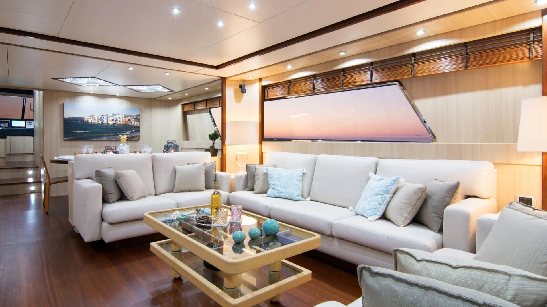 a living room with a large screen aboard ACIONNA Yacht for Sale
