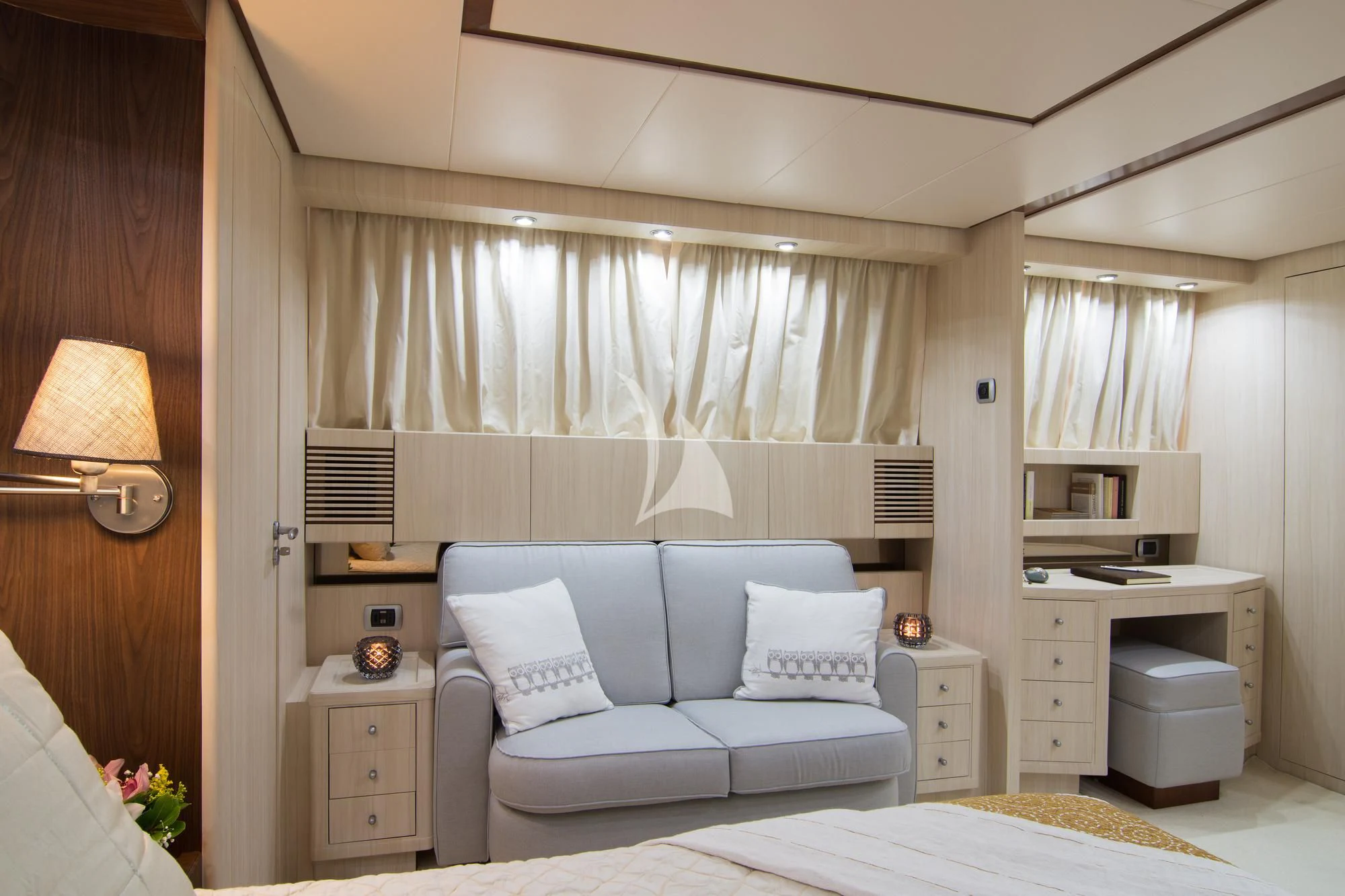 a room with a bed and a desk aboard ACIONNA Yacht for Sale