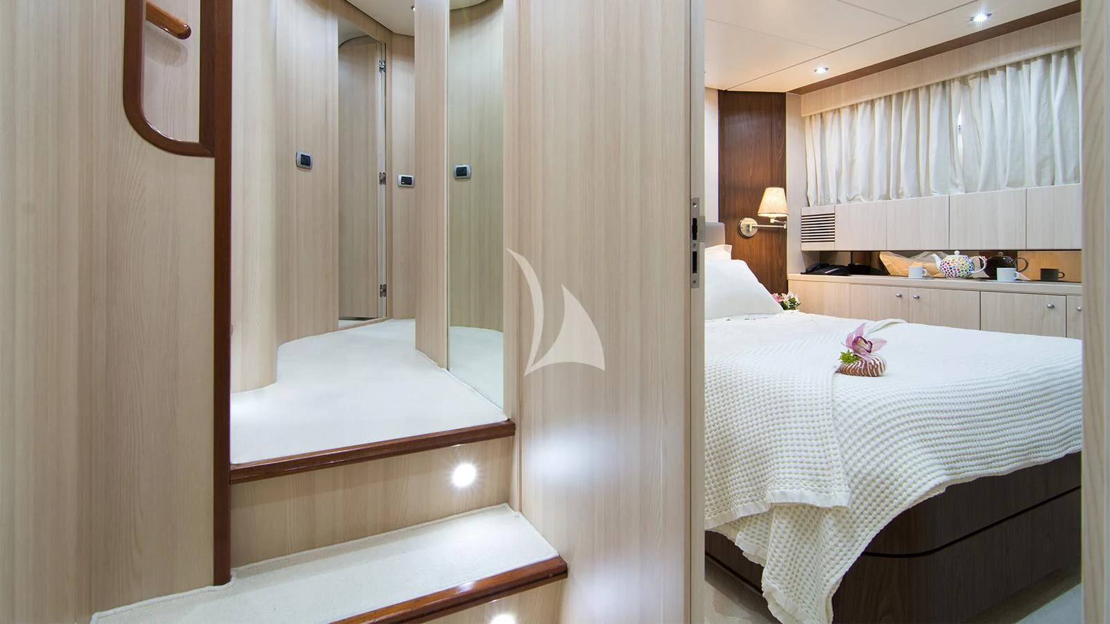 a room with two beds aboard ACIONNA Yacht for Sale