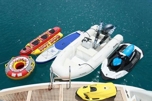 a boat on a body of water aboard ACIONNA Yacht for Sale