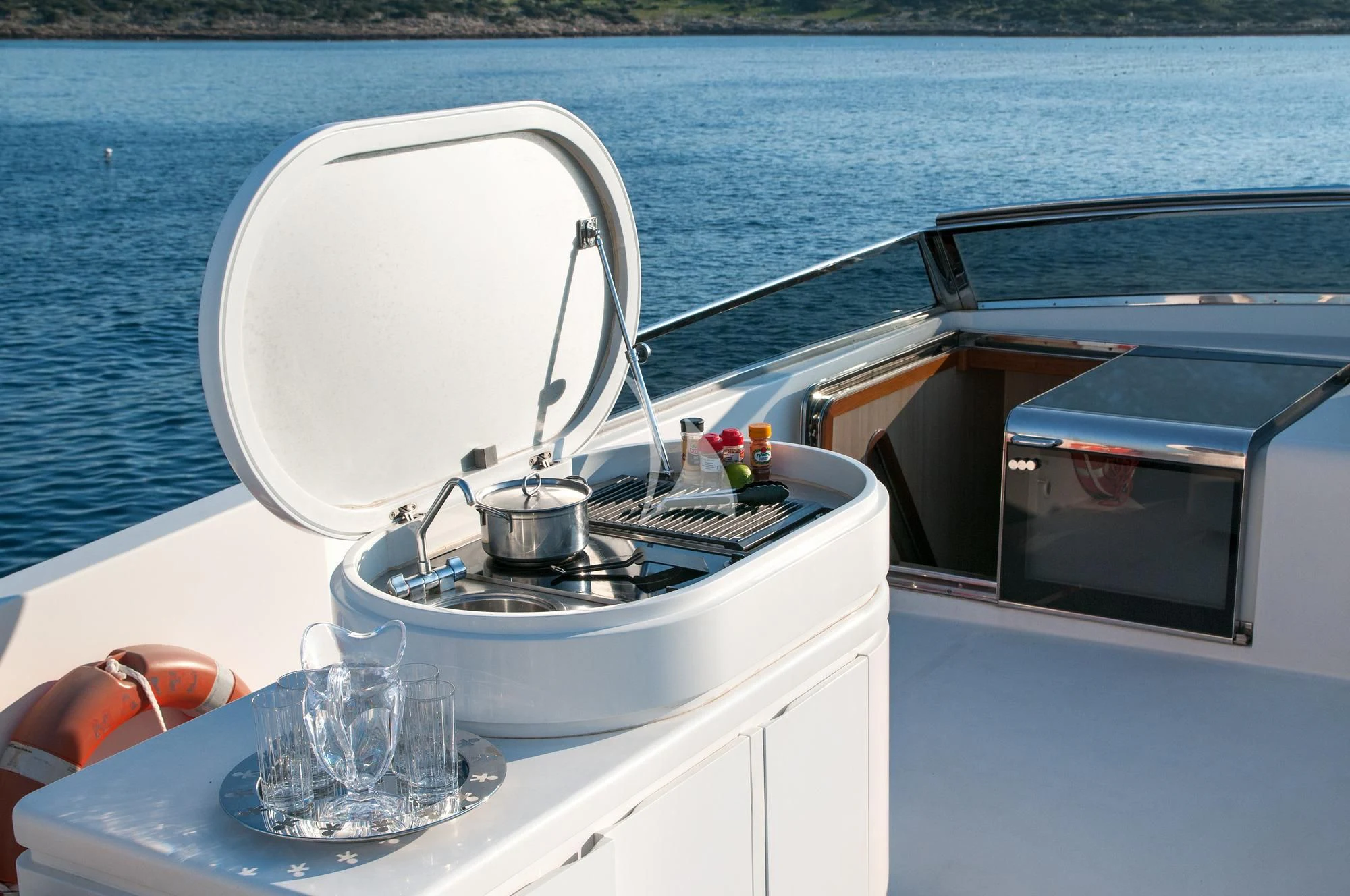 a boat with a clear glass and a clear glass on the front aboard ACIONNA Yacht for Sale