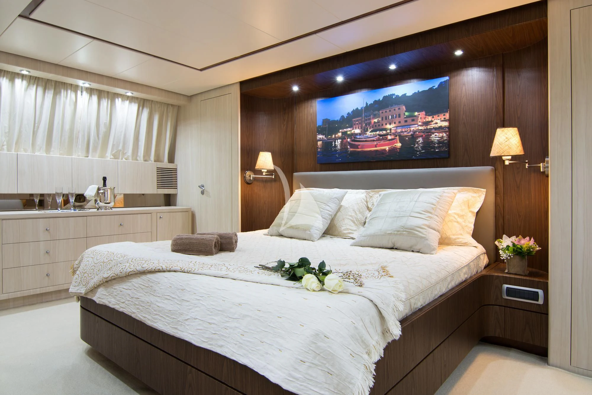 a bed with white sheets aboard ACIONNA Yacht for Sale
