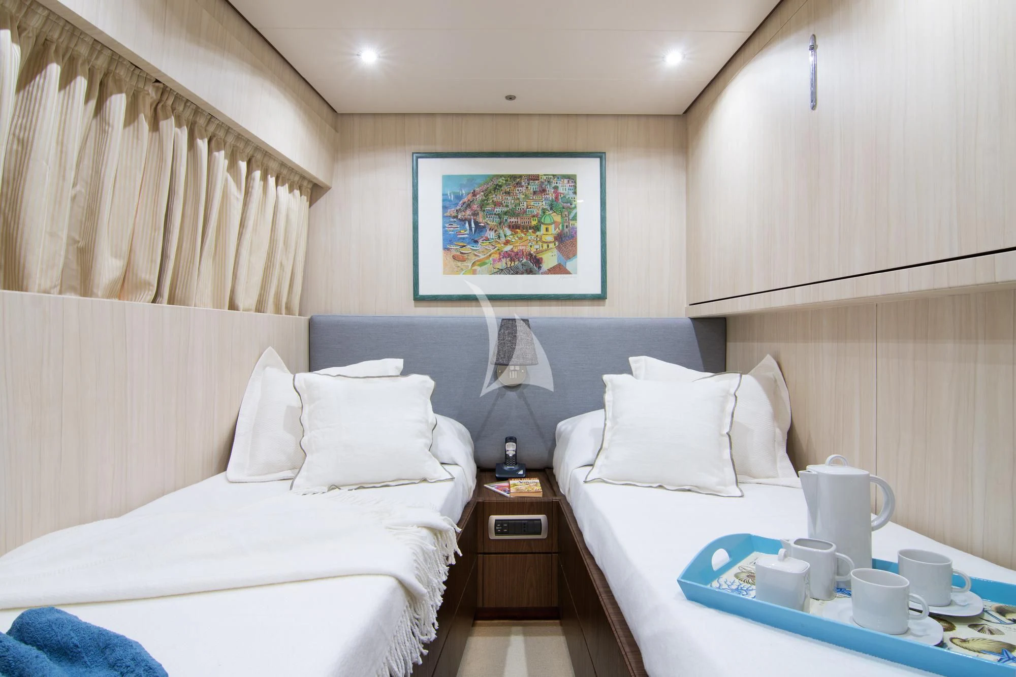 a room with two beds aboard ACIONNA Yacht for Sale