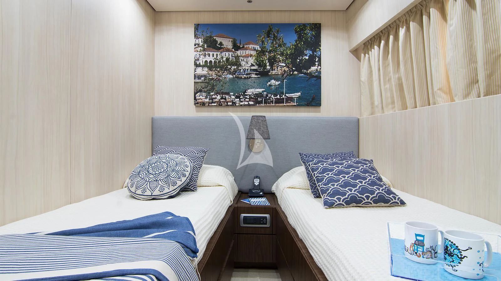 a room with two beds aboard ACIONNA Yacht for Sale
