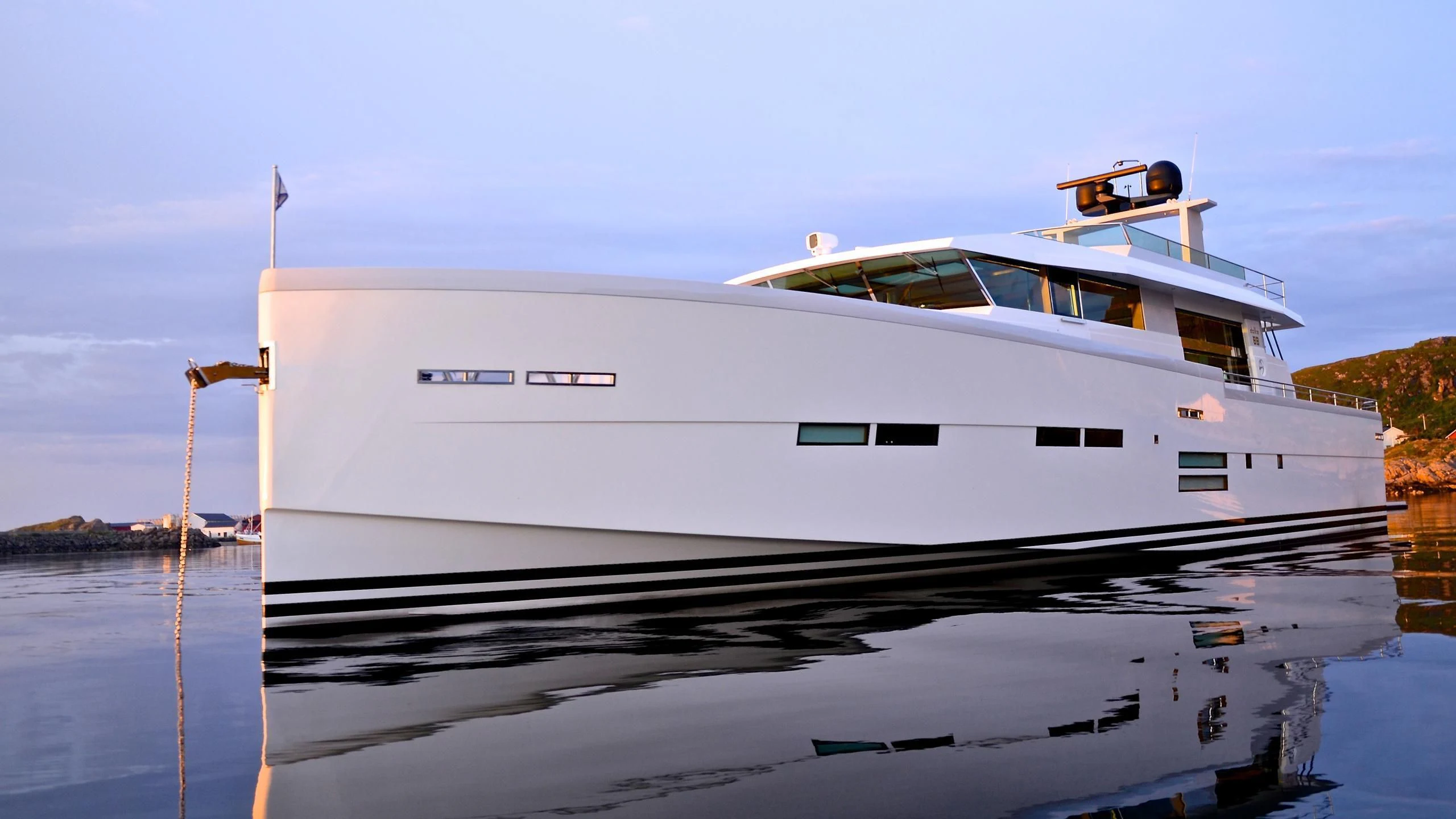 a white yacht on the water aboard BIG BEAVER Yacht for Sale