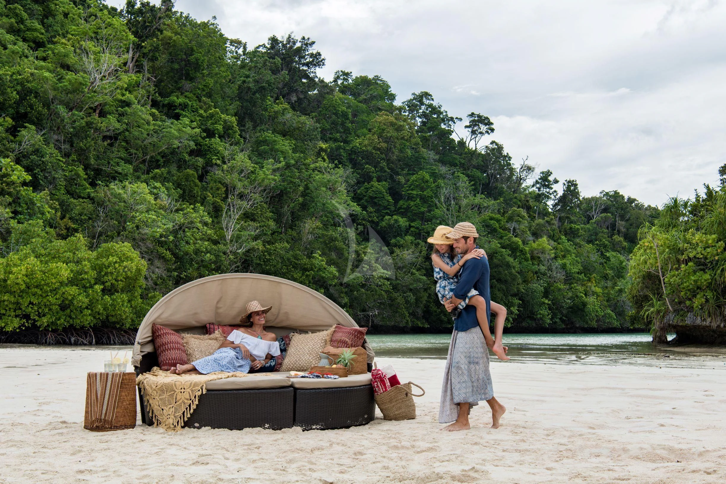 a woman and a man in a boat on a beach aboard SEQUOIA Yacht for Sale