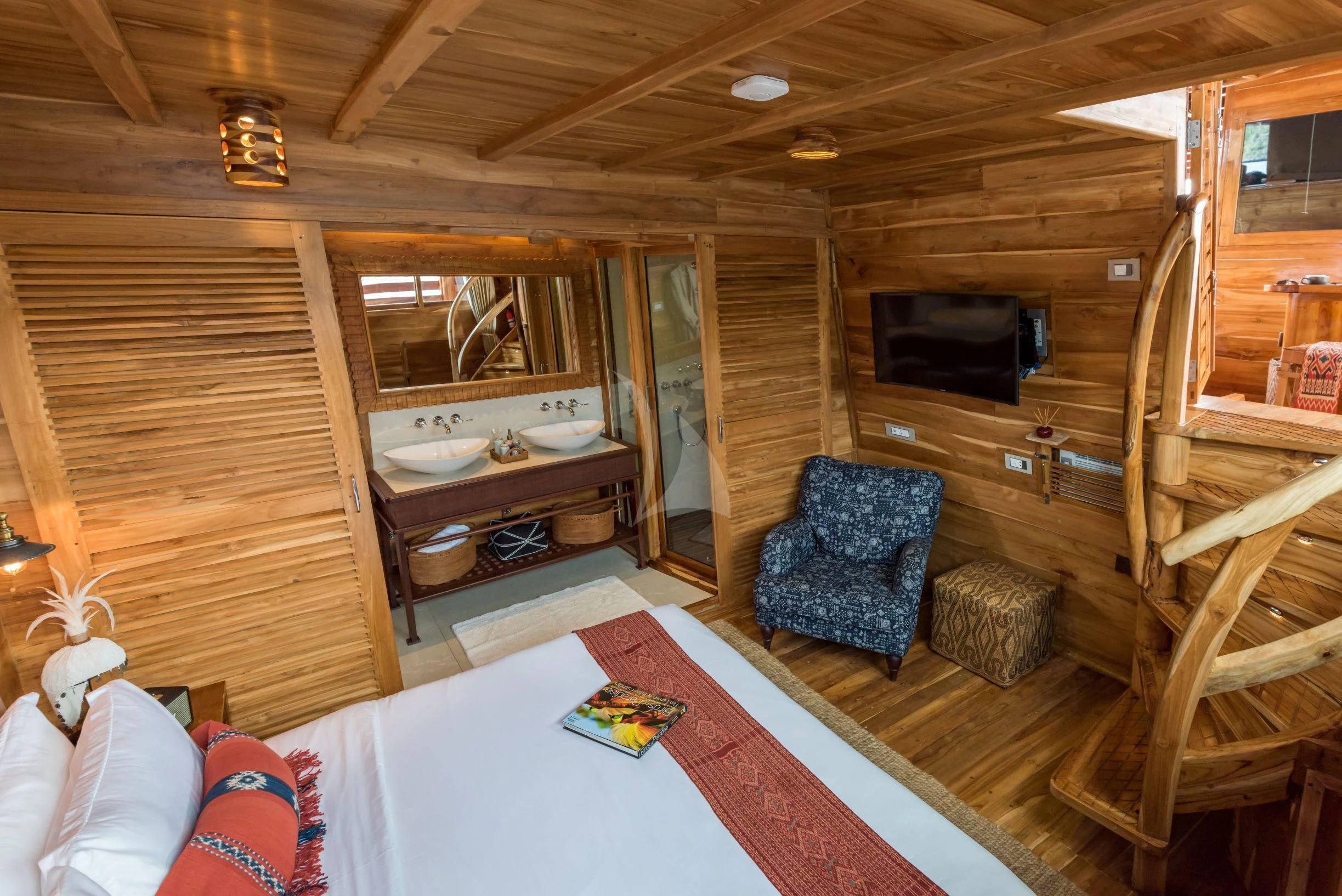 a living room with a table and chairs aboard SEQUOIA Yacht for Sale