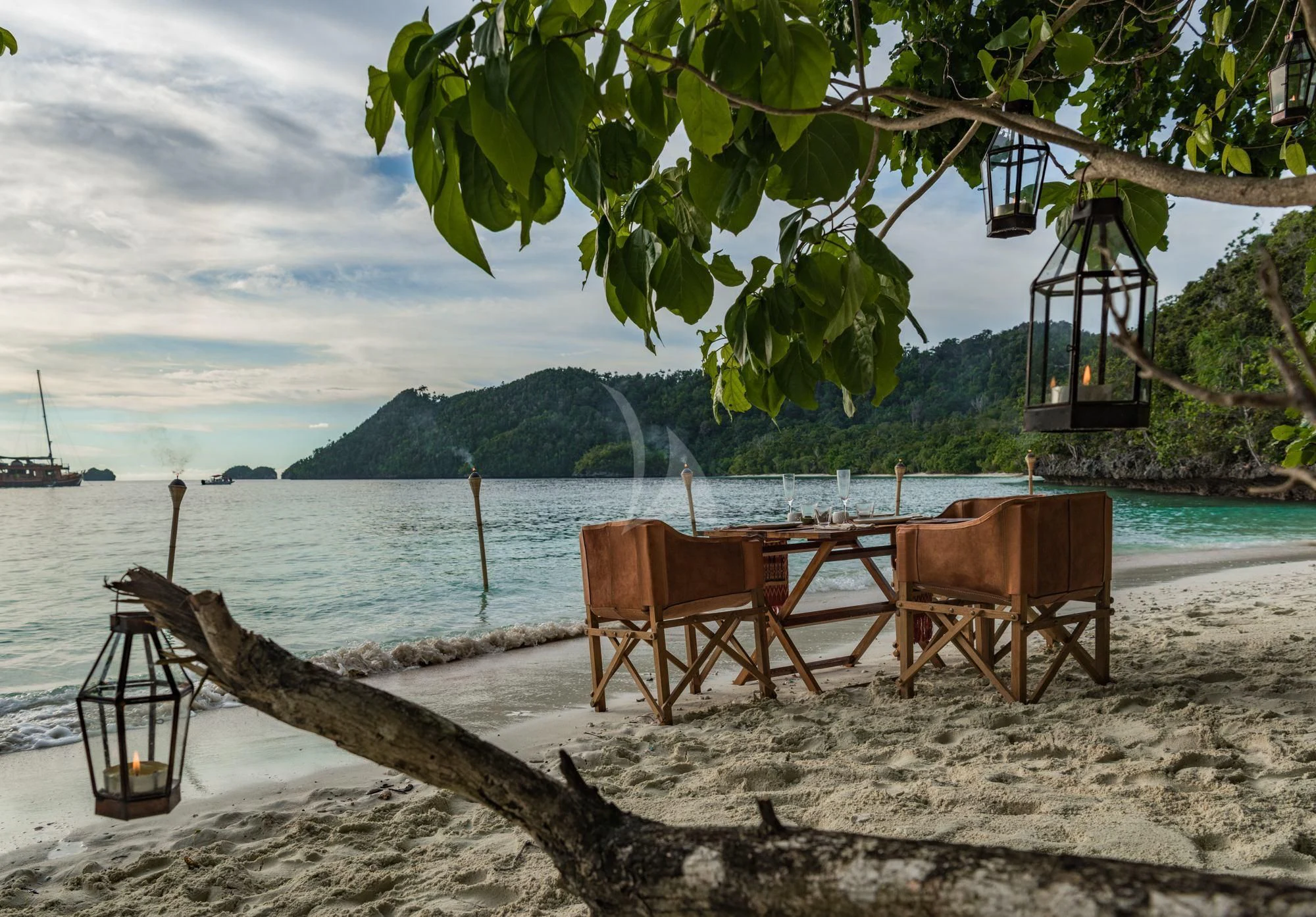 a couple of chairs on a beach aboard SEQUOIA Yacht for Sale