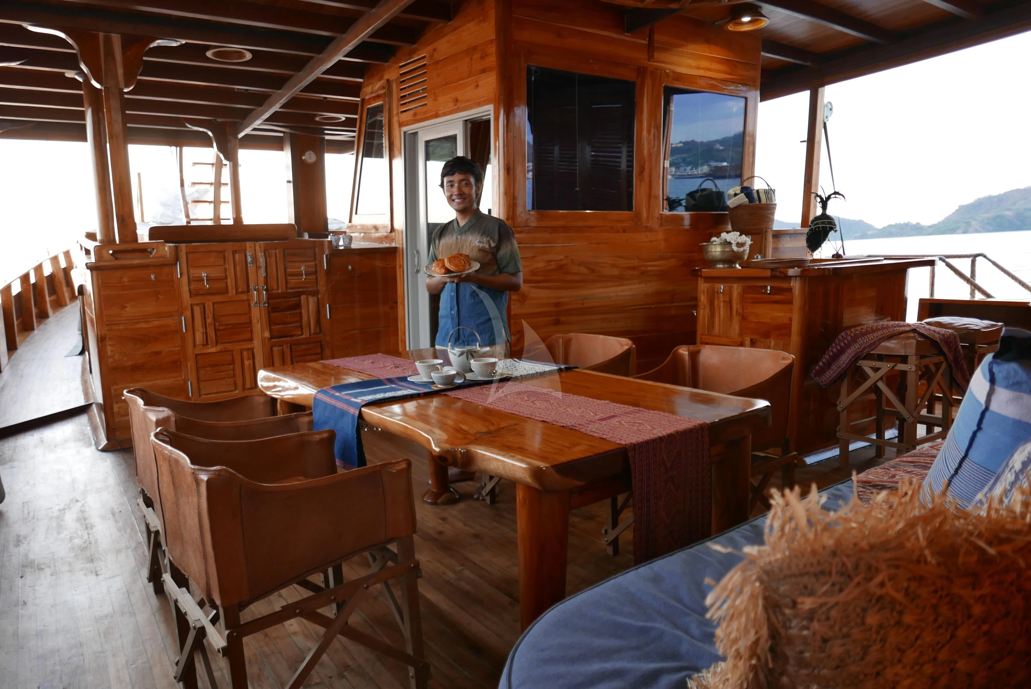 a person standing in a cabin aboard SEQUOIA Yacht for Sale