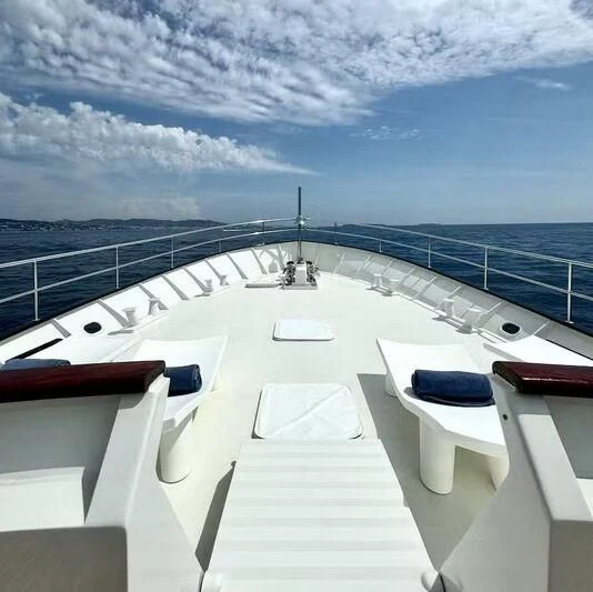 a deck with a view of the water and the sky aboard ABELY Yacht for Sale