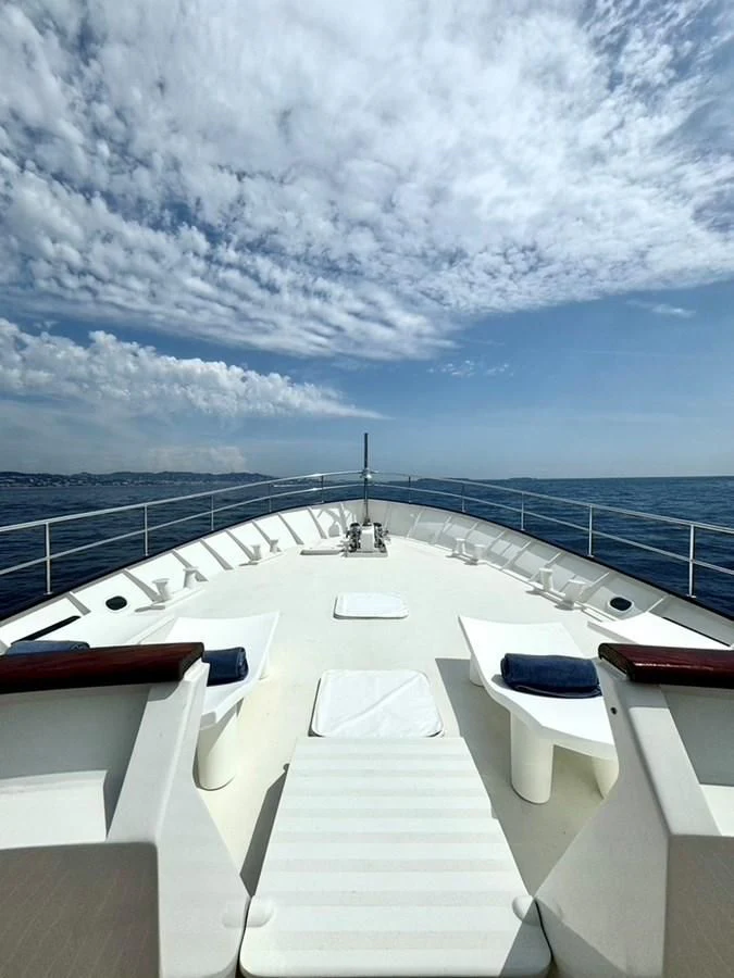 a deck with a view of the water and the sky aboard ABELY Yacht for Sale