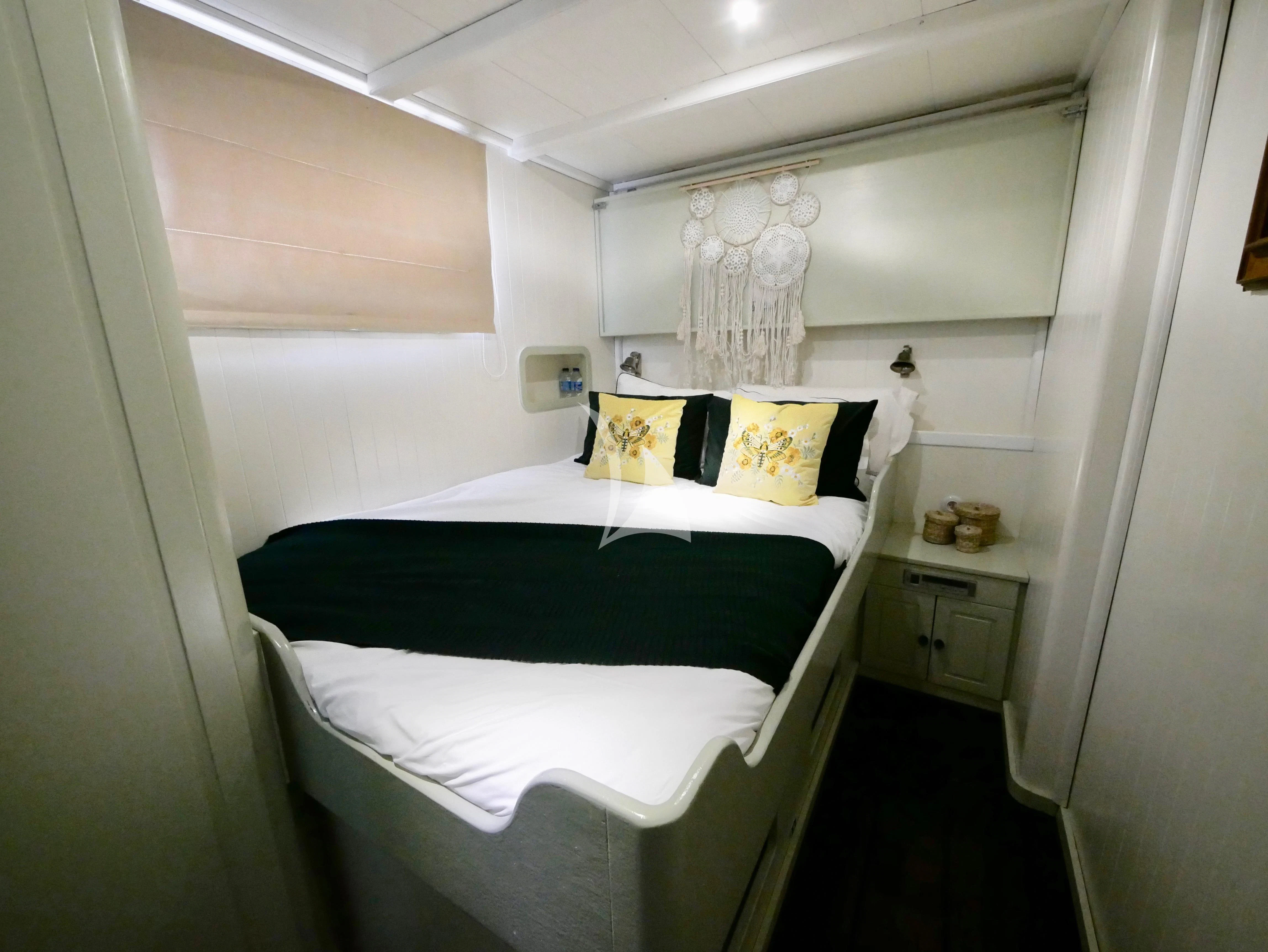 a couple of beds in a room aboard ABELY Yacht for Sale