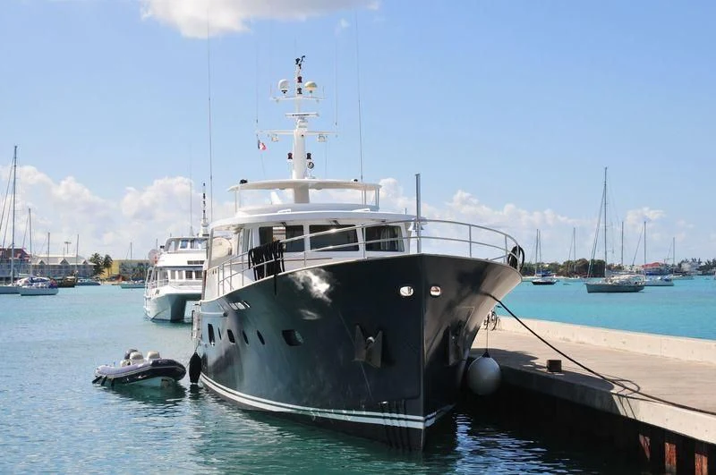 a boat docked at a pier aboard ABELY Yacht for Sale