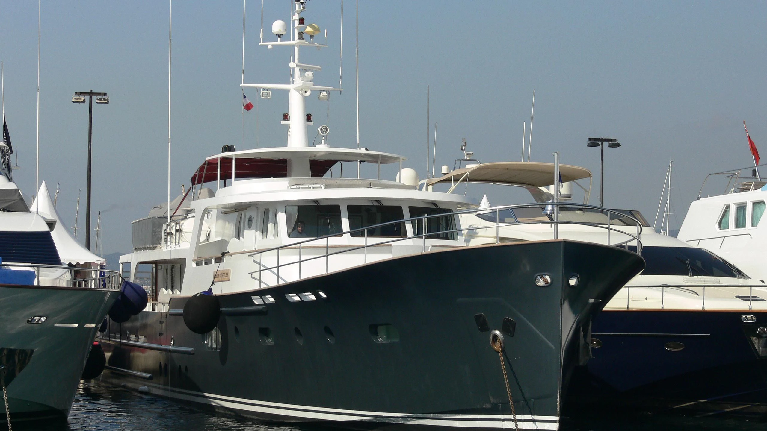 a group of boats are parked in a harbor aboard ABELY Yacht for Sale