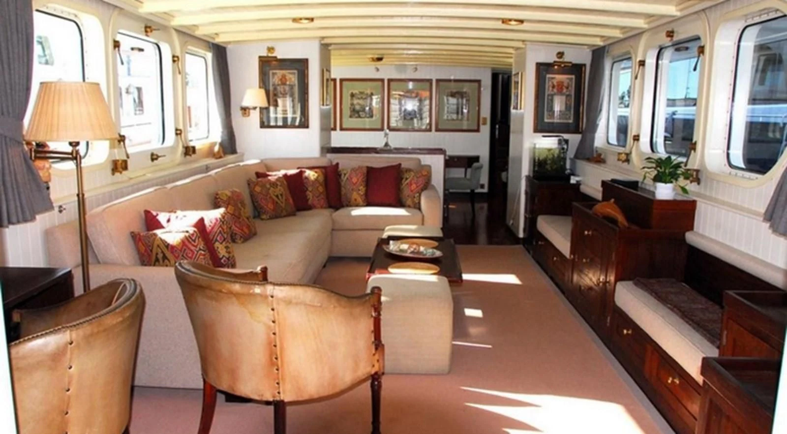 a living room with a couch and a coffee table aboard ABELY Yacht for Sale